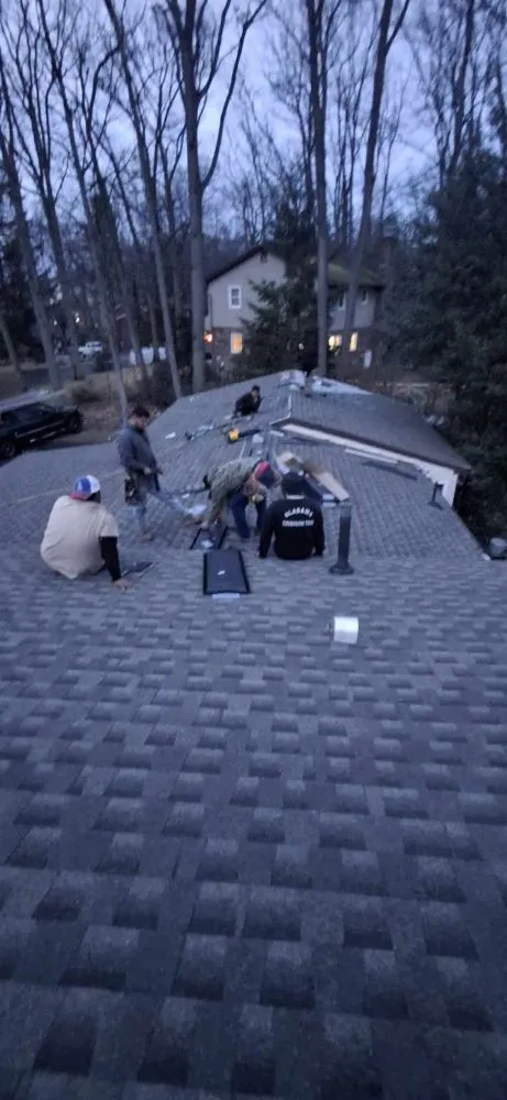 Slide of Tip-Top Roofing Solutions