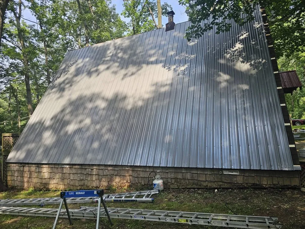 Slide of Tip-Top Roofing Solutions