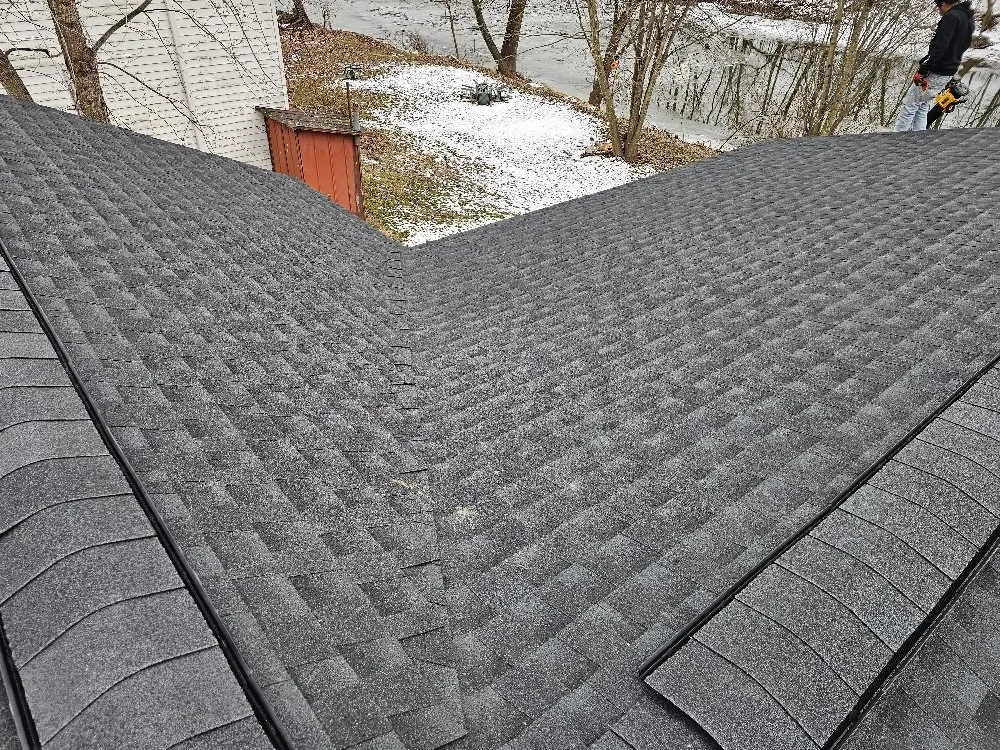 Slide of Tip-Top Roofing Solutions