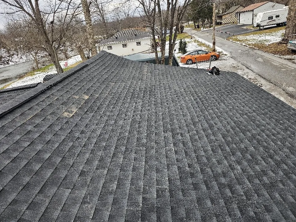 Slide of Tip-Top Roofing Solutions