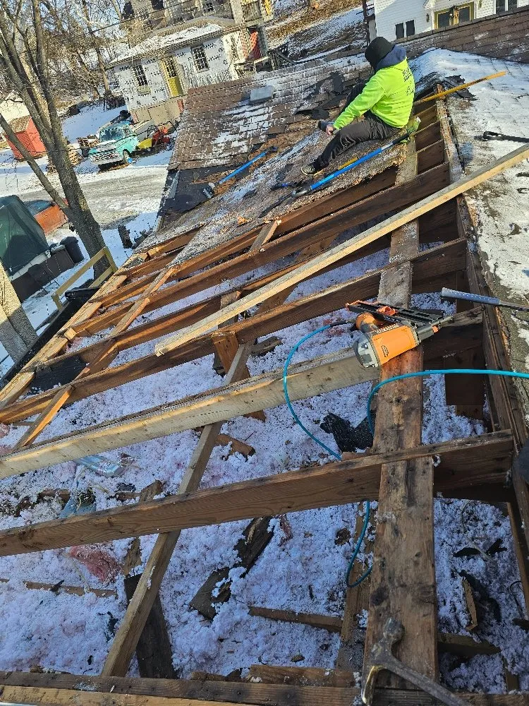 Slide of Tip-Top Roofing Solutions