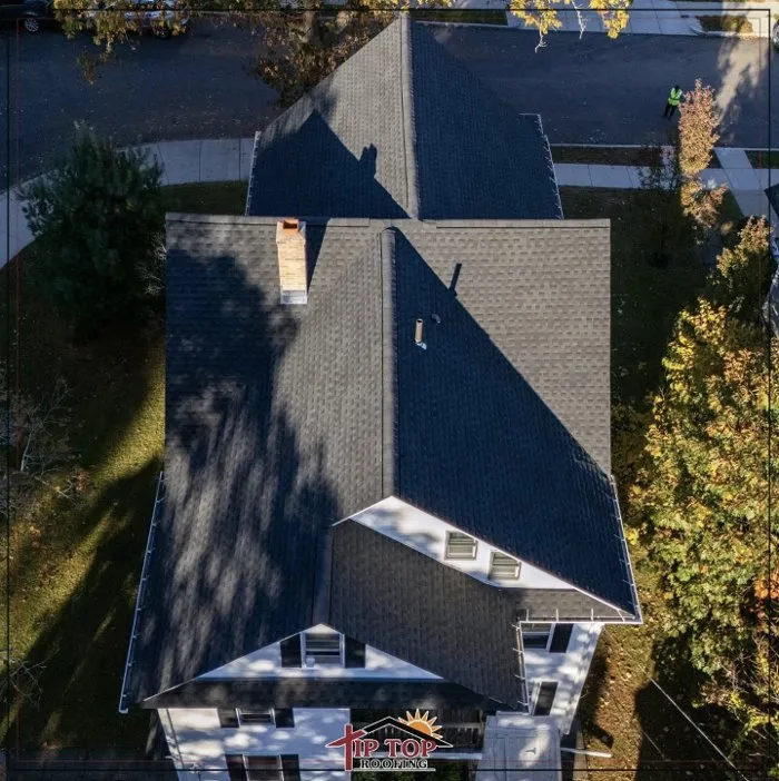 Slide of Tip Top Roofing