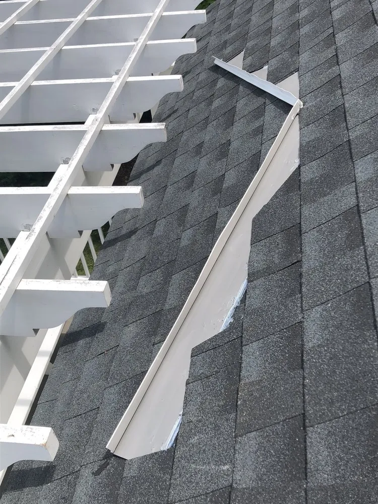 Slide of Tip Top Roofing