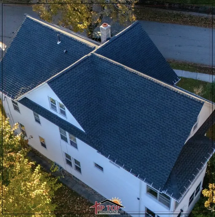 Slide of Tip Top Roofing