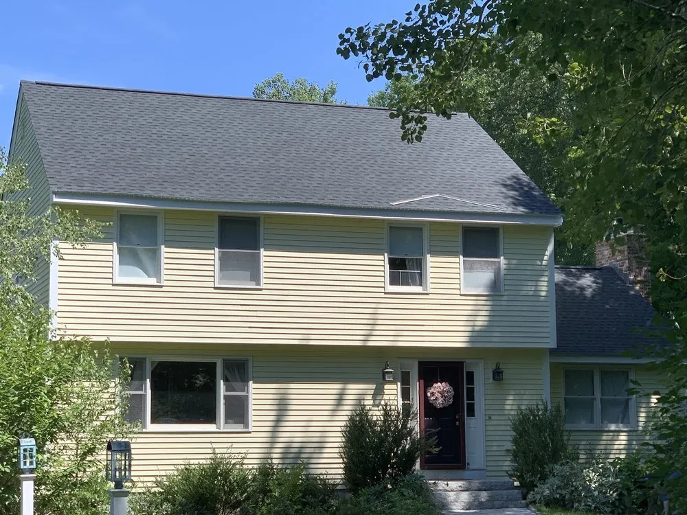 Slide of Tip Top Roofing