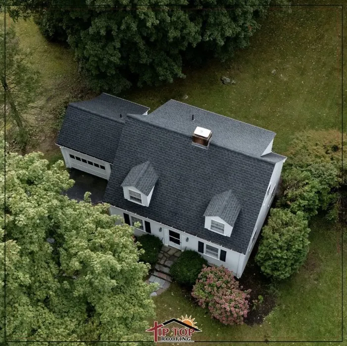 Slide of Tip Top Roofing