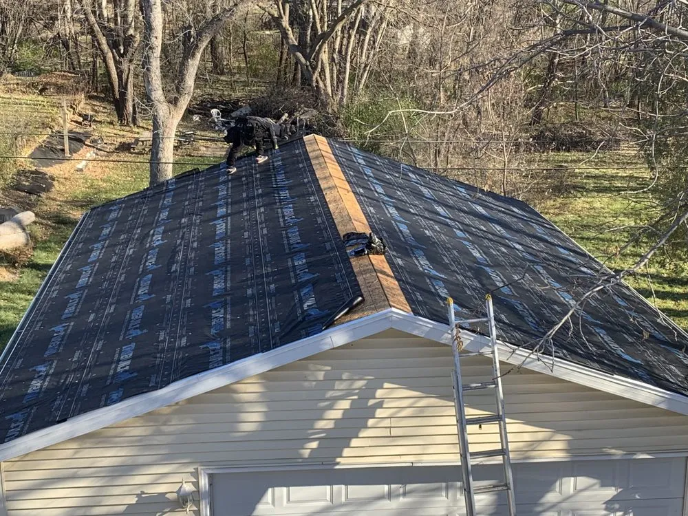 Slide of Tiptop Roofing