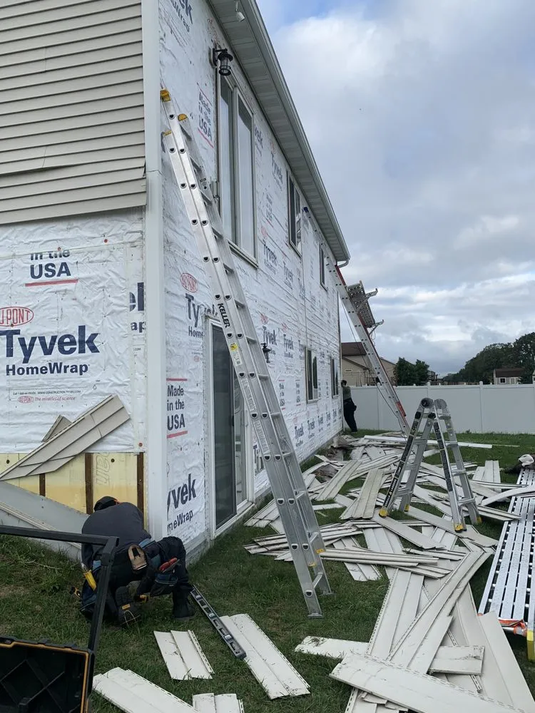 Slide of Tiptop Roofing