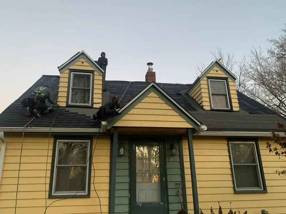 Slide of Tiptop Roofing