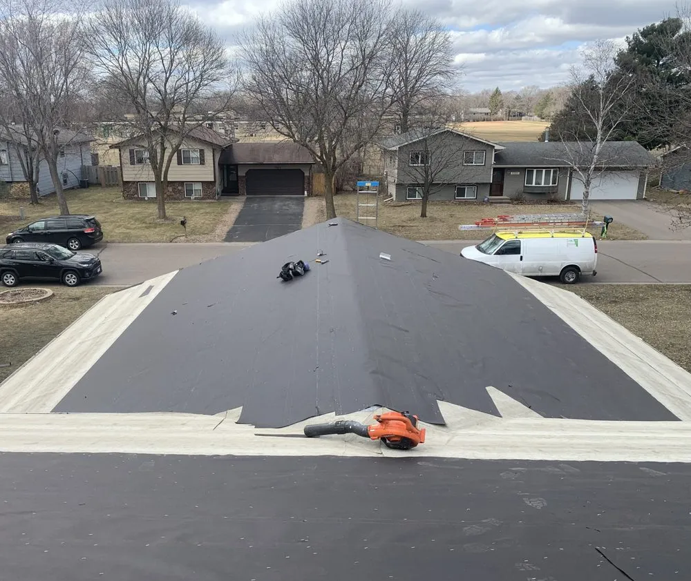 Slide of Tiptop Roofing