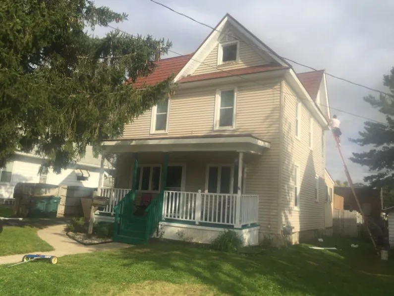 Slide of Titan Exteriors