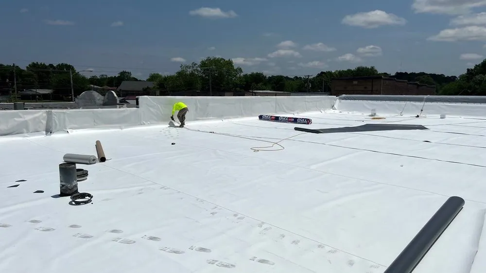 Slide of Titan Roofing & Construction