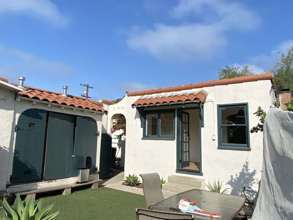 Slide of Titan Roofing & Rain Gutters Inc.