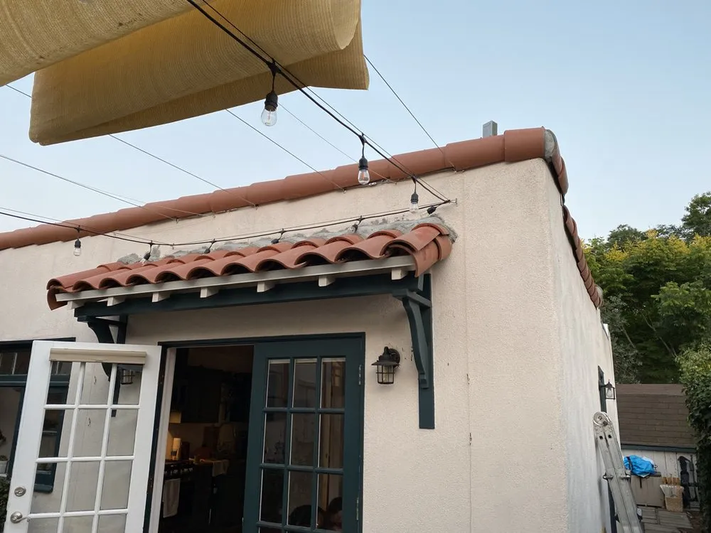 Slide of Titan Roofing & Rain Gutters Inc.