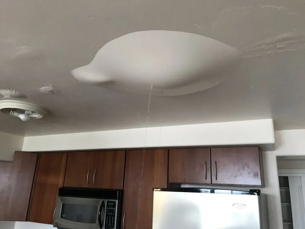 Slide of Titan Roofing & Rain Gutters Inc.