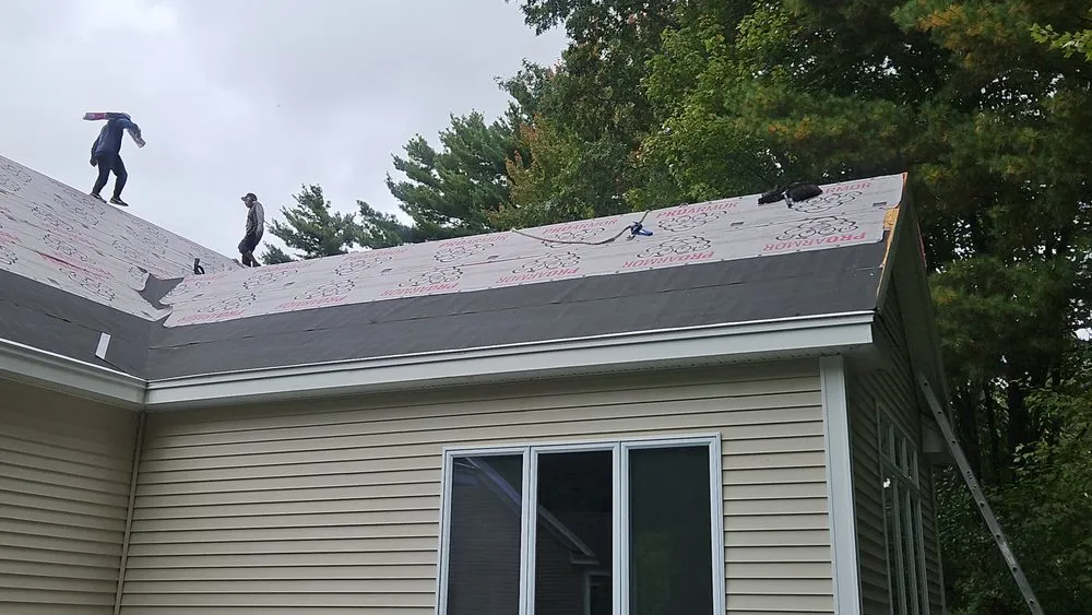 Slide of Titan Roofing and Exteriors