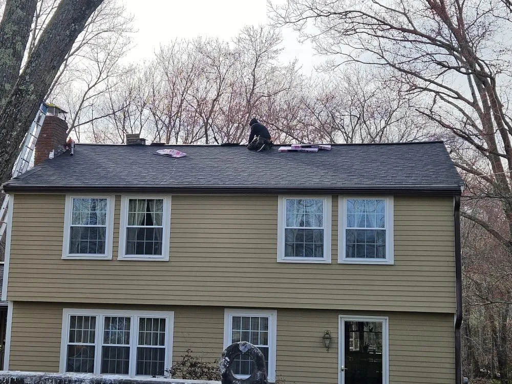 Slide of Titan Roofing and Exteriors