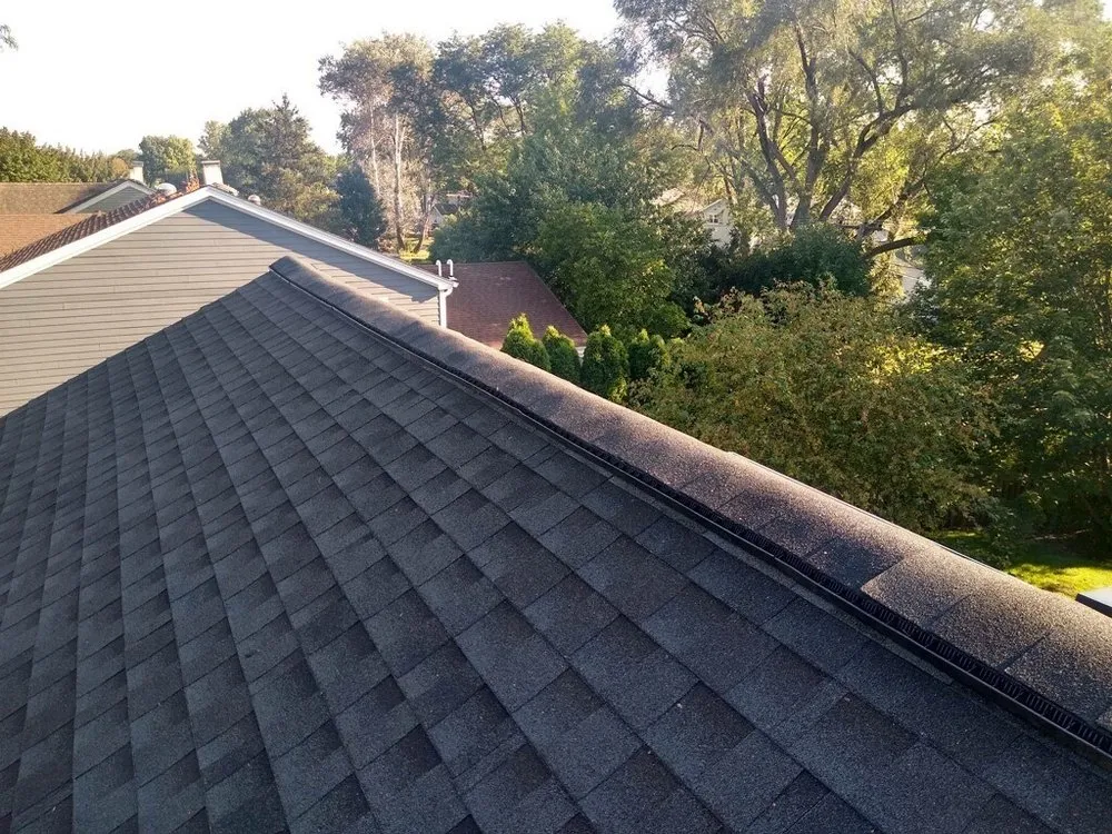 Slide of Titan Roofing