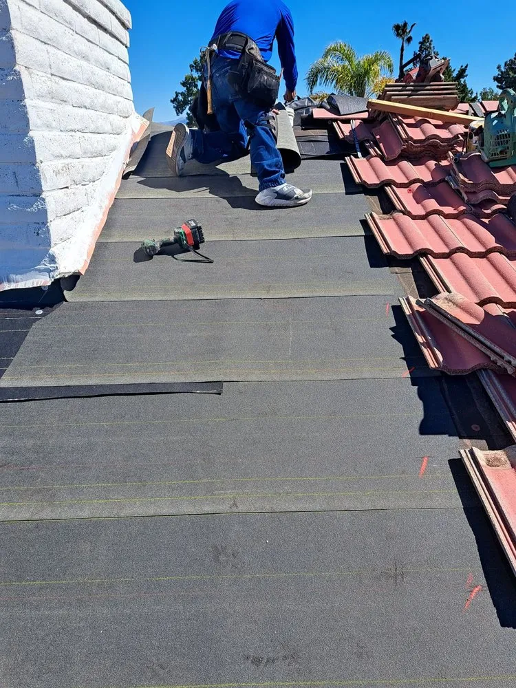 Slide of Titan Roofing