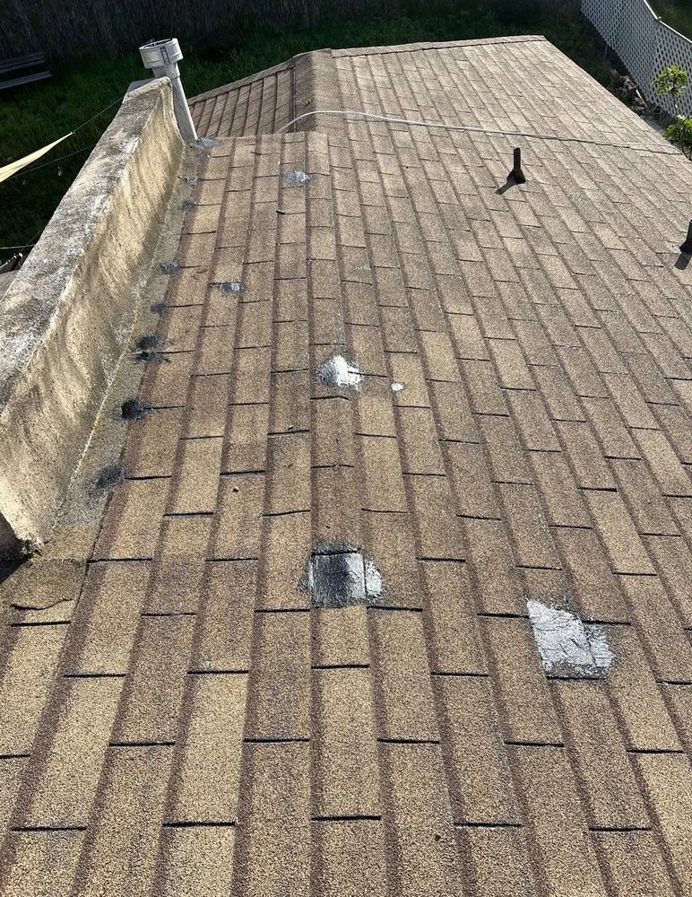 Slide of Titan Roofing