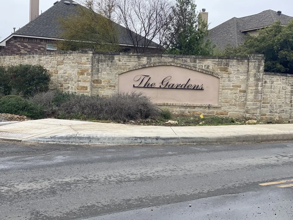 Slide of Titan Roofing Helotes