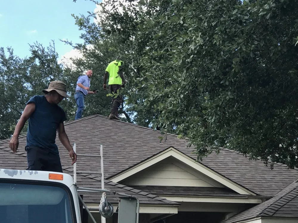 Slide of Titan Roofing