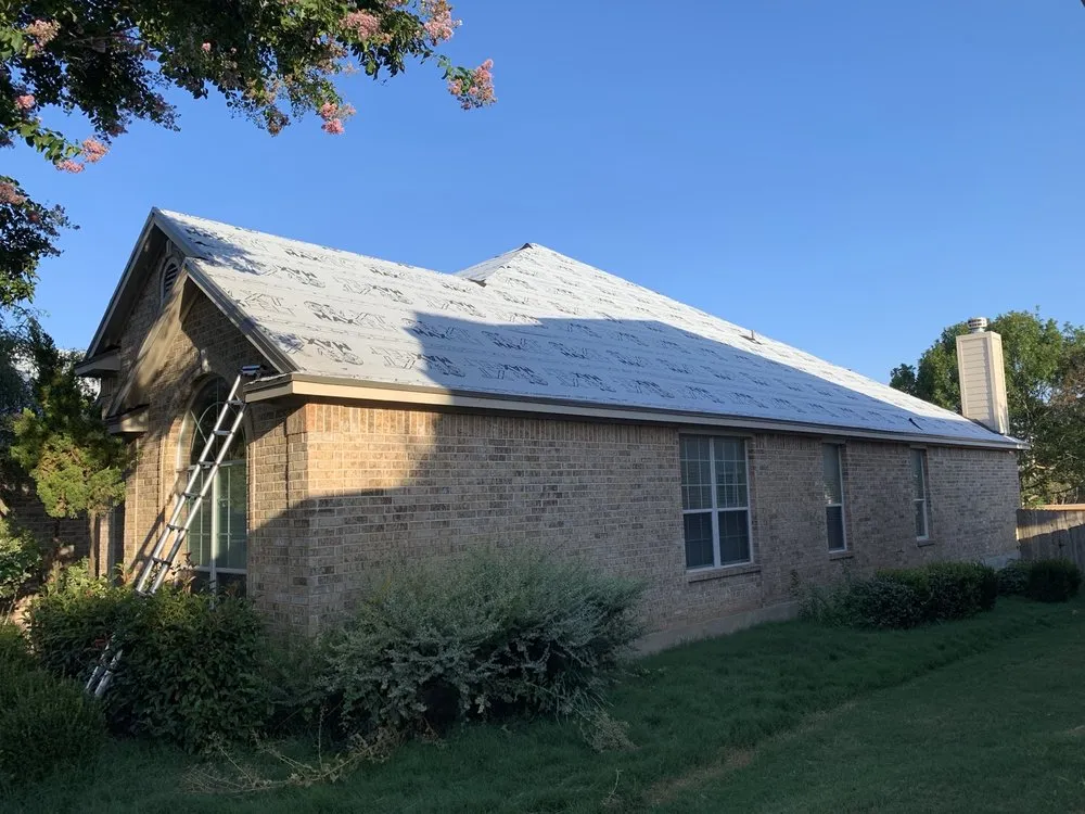 Slide of Titan Roofing