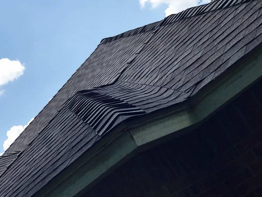 Slide of Titan Roofing