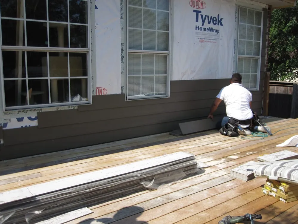 Slide of Titan Siding, Windows and Exteriors