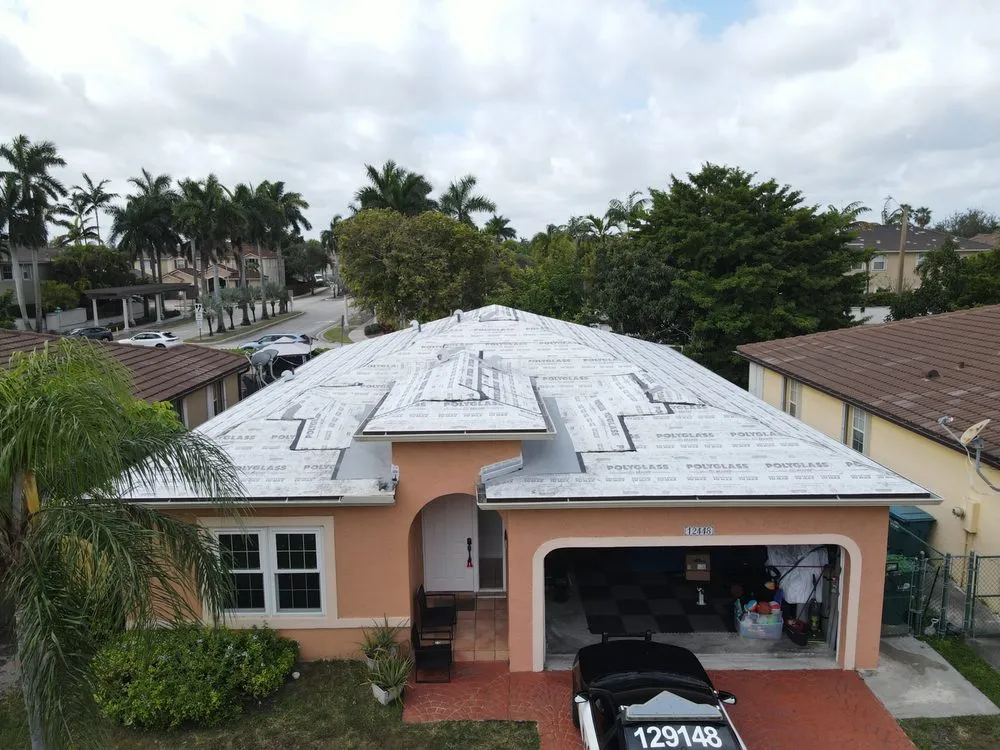 Slide of TJ Platinum Roofing