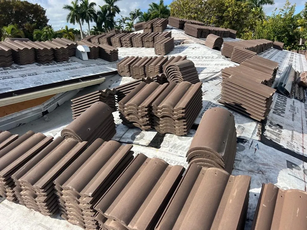 Slide of TJ Platinum Roofing