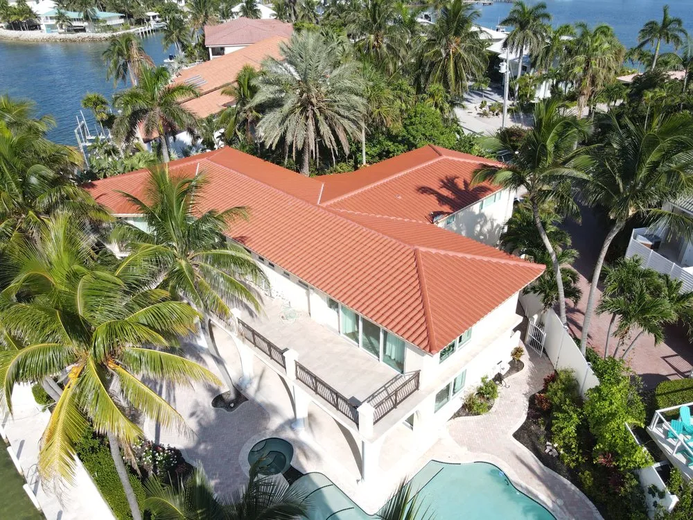 Slide of TJ Platinum Roofing