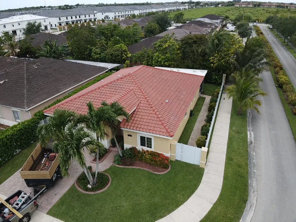 Slide of TJ Platinum Roofing