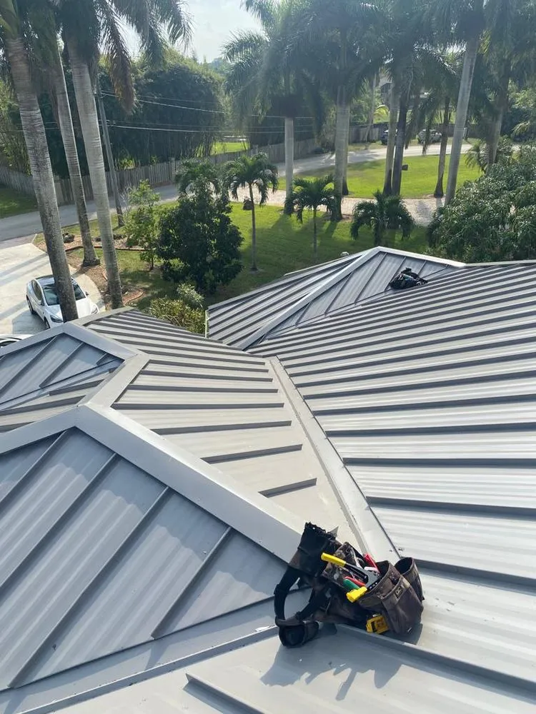 Slide of TJ Platinum Roofing