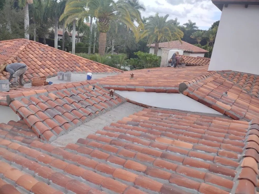 Slide of TJ Platinum Roofing