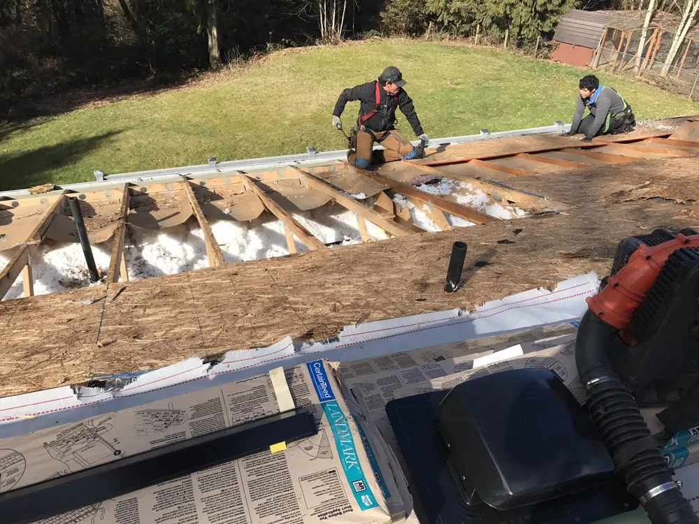 Slide of TJ Roofing llc