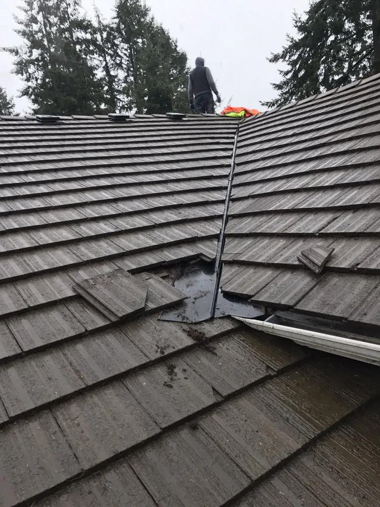 Slide of TJ Roofing llc