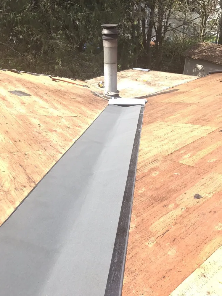 Slide of TJ Roofing llc