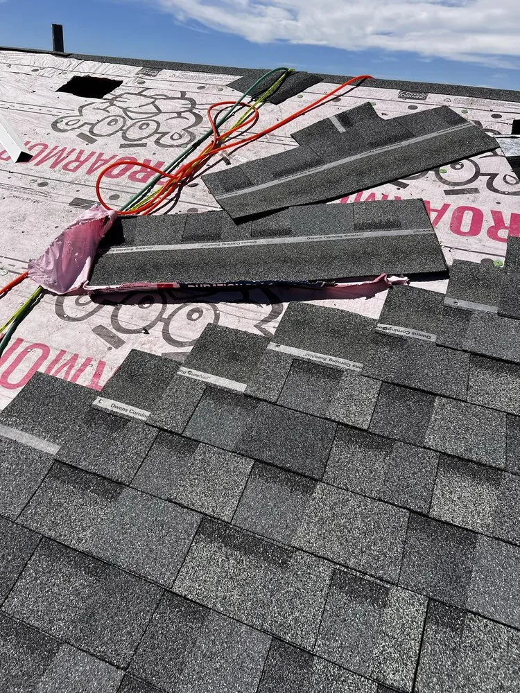 Slide of TJM Roofing and Construction