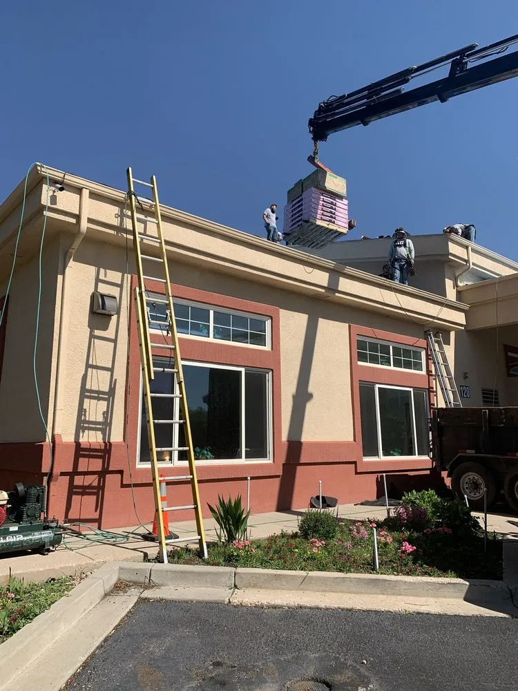 Slide of TJM Roofing and Construction