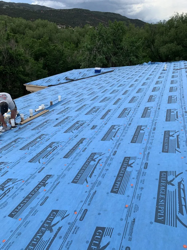 Slide of TJM Roofing and Construction