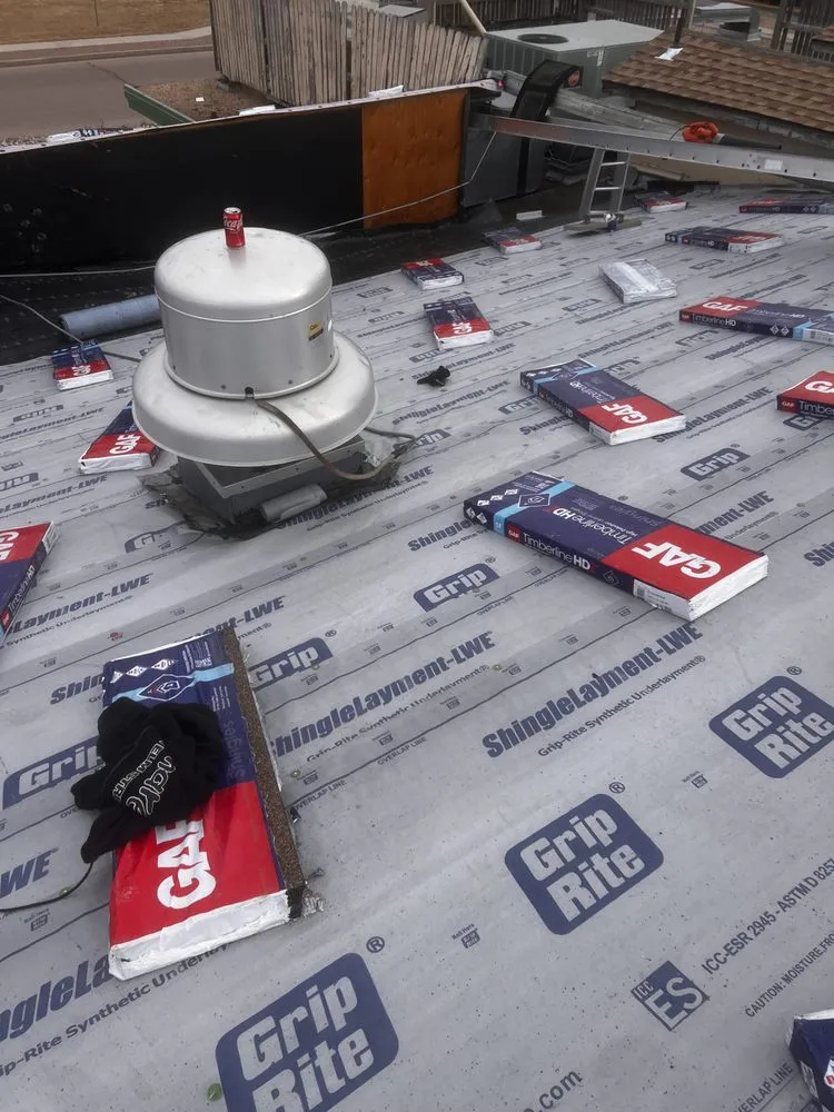 Slide of TJM Roofing and Construction