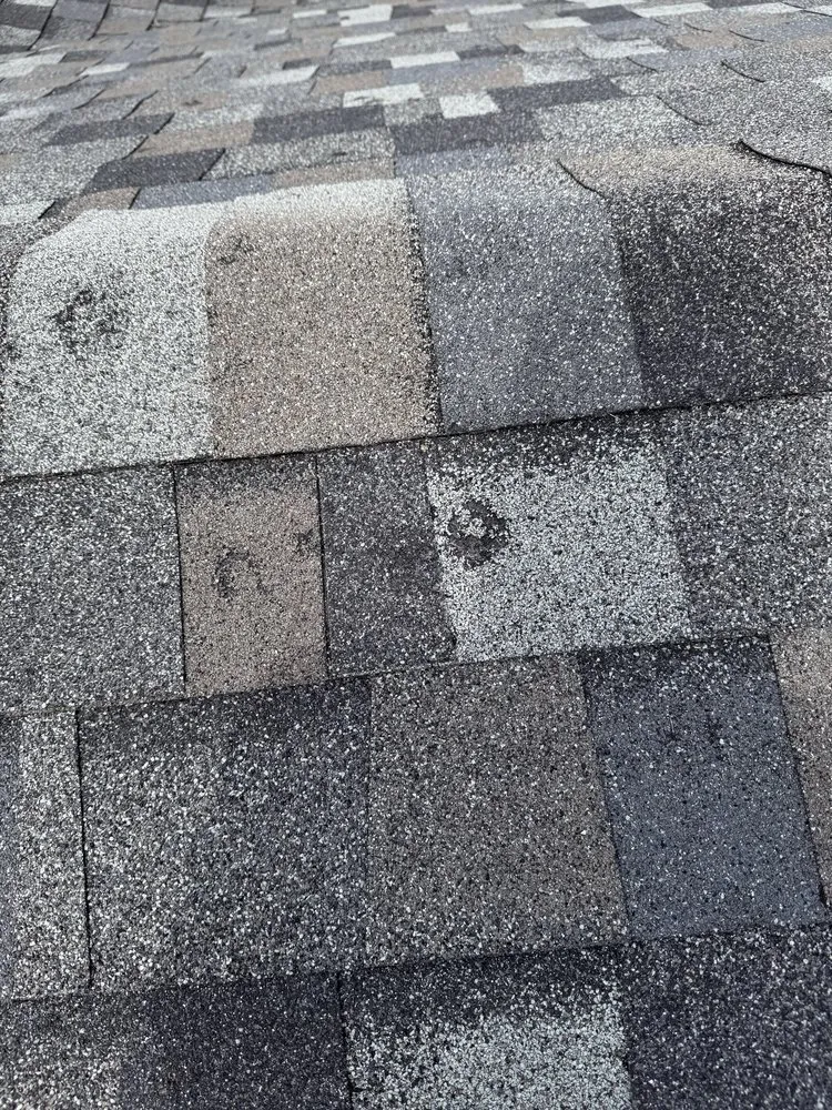 Slide of TJM Roofing and Construction