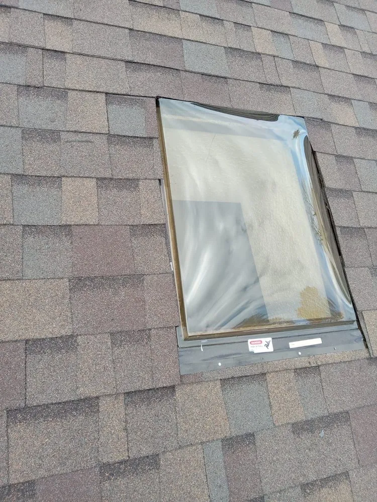 Slide of TK Roofing and Gutters