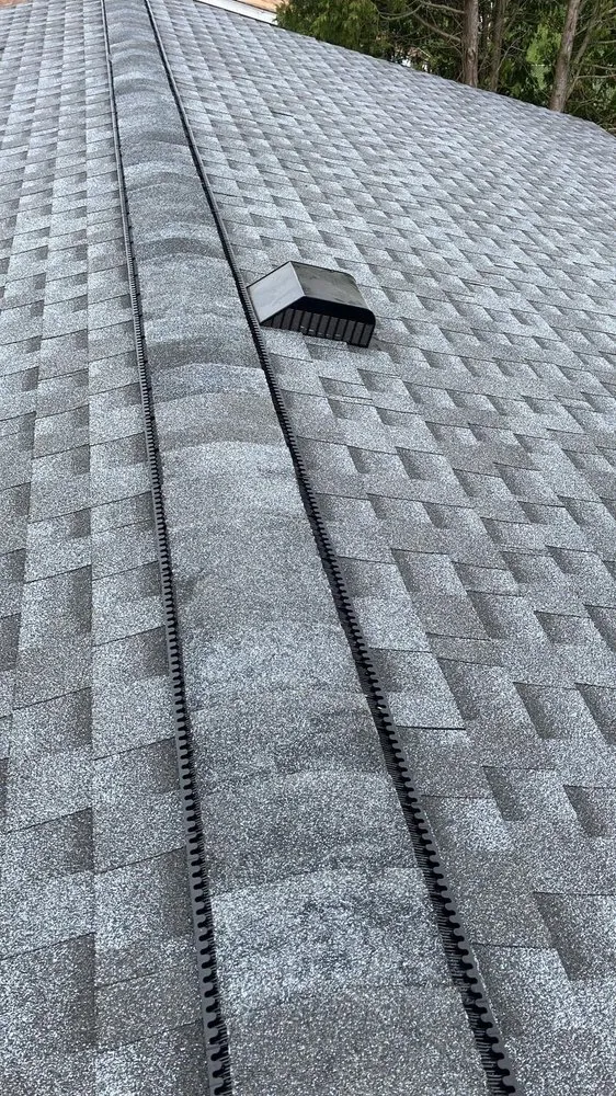 Slide of TK Roofing and Gutters