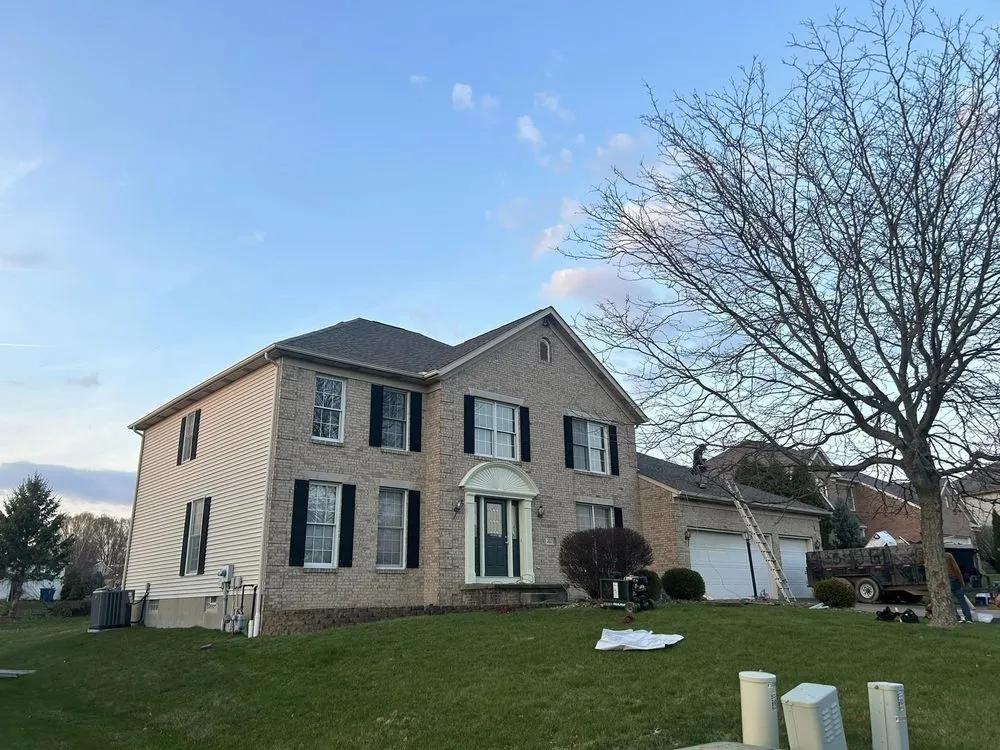 Slide of TK Roofing and Gutters