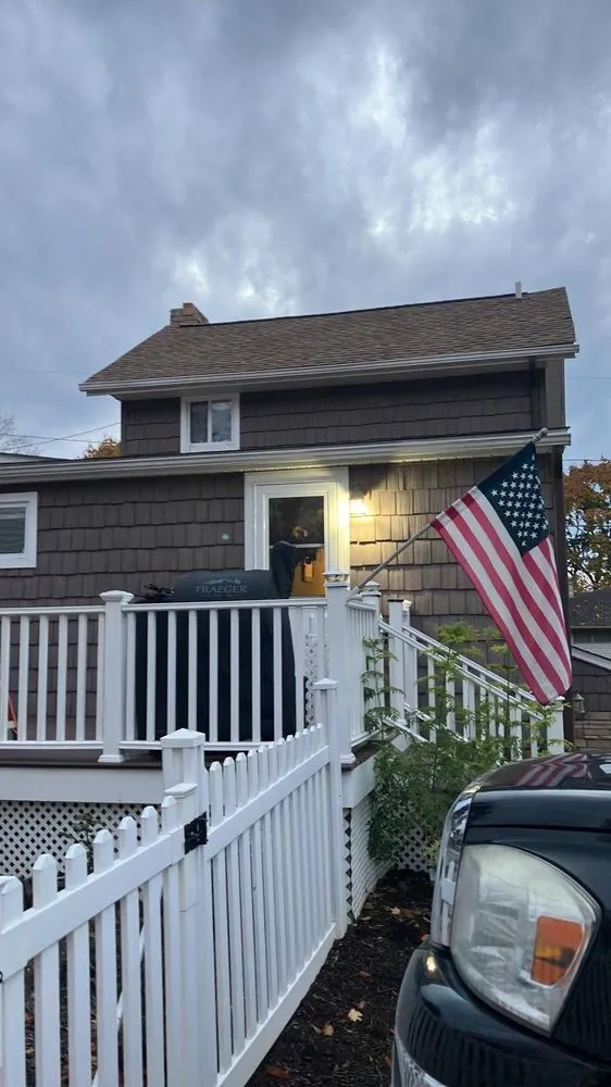 Slide of TK Roofing and Gutters