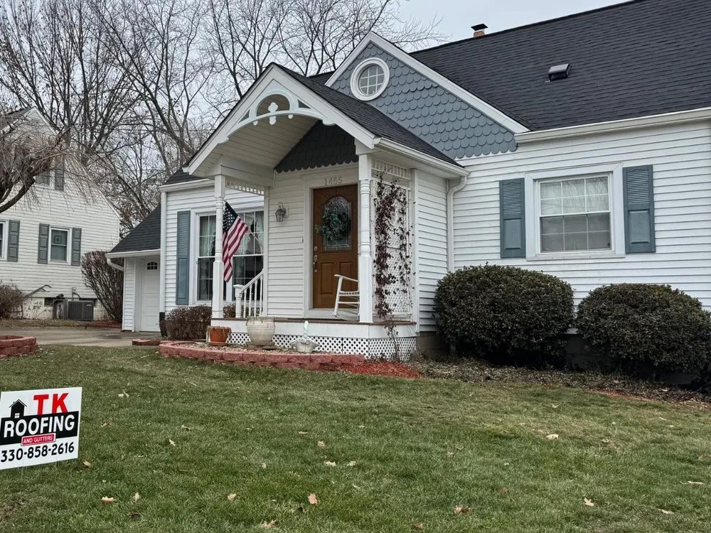 Slide of TK Roofing and Gutters