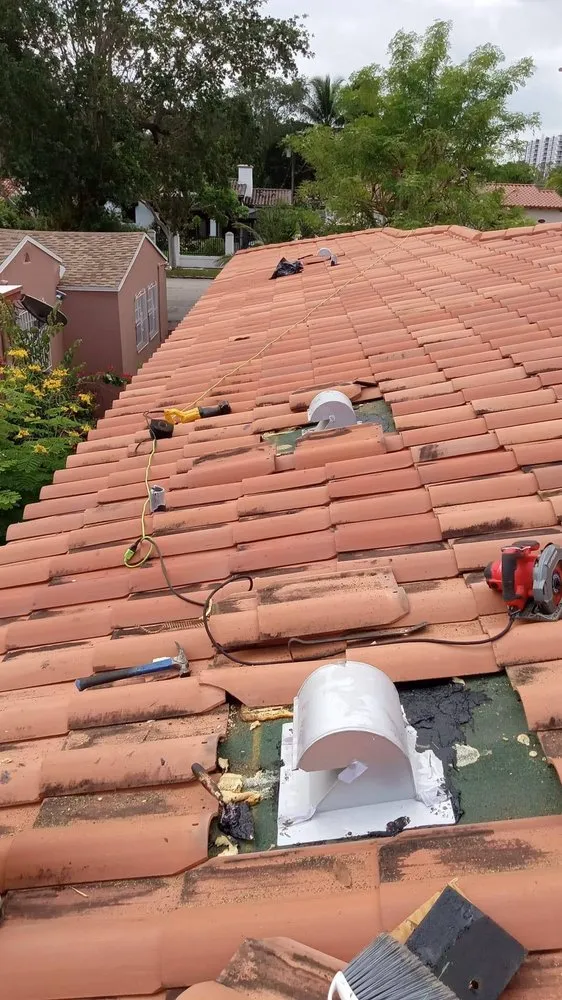 Slide of TK Roofing Contractor Miami