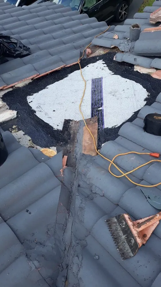 Slide of TK Roofing Contractor Miami